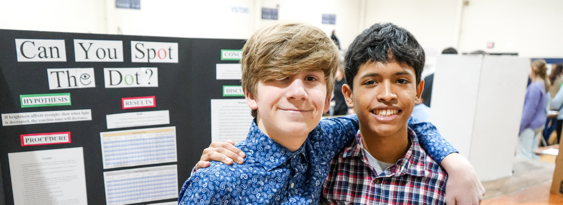 Students show off their submission at the FHSD Science Fair